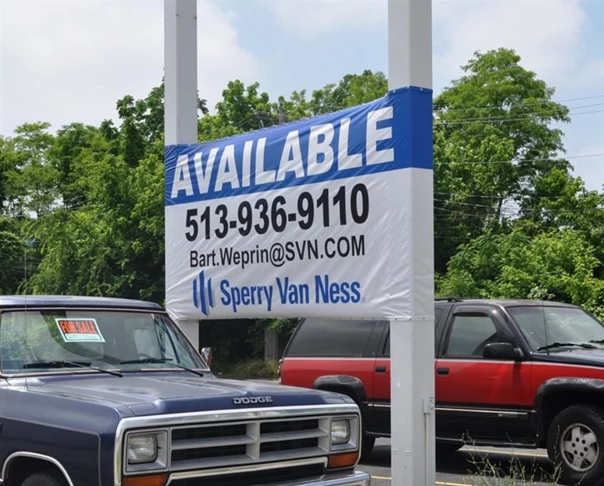In a tight spot?  Weve got your signage solution!  (Banner system by Signs Now Cincinnati for Sperry Van Ness, Liberty Twp, OH)