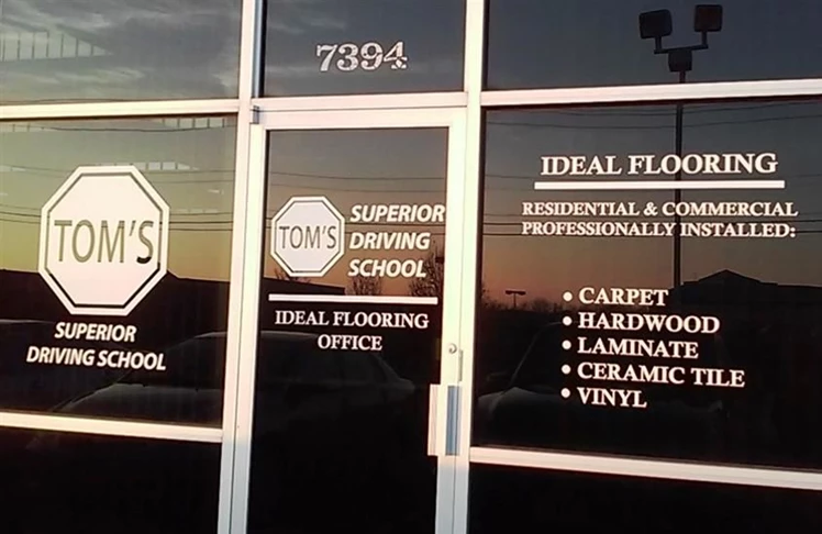 Drive business to your door with cut vinyl window graphics!  (Cut vinyl window graphics by Signs Now Cincinnati for Toms Superior Driving School, Liberty Township, OH)