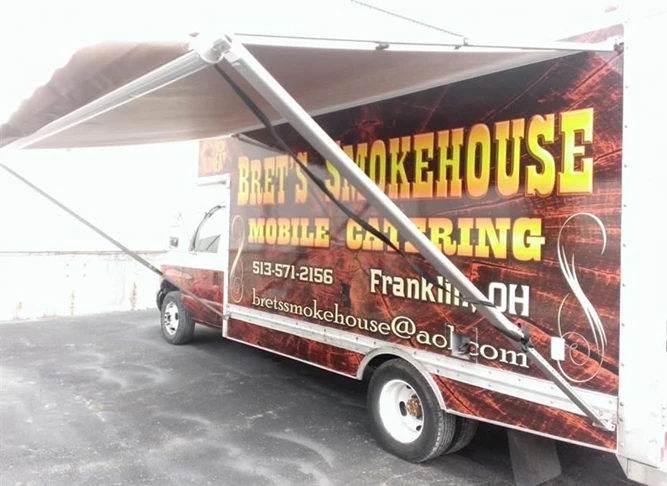 Spice up your business with digitally printed vehicle wraps!  (Digitally Printed Vehicle Wrap by Signs Now Cinncinati for Brets Smokehouse Mobile Catering, Franklin, OH)