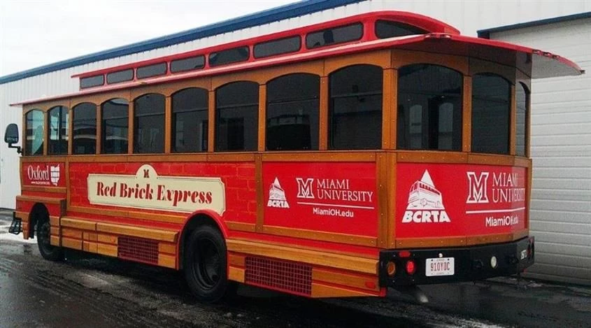 Get around in style with our digitally printed wraps and installation services!  (Digital vehicle wraps by Signs Now Cincinnati for Miami University Red Brick Express, Oxford, OH)