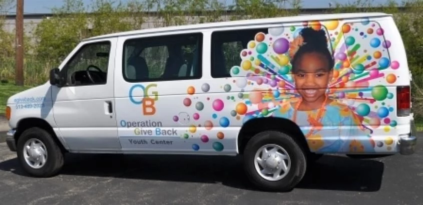3/4 vehicle wrap (Vehicle Wrap by Signs Now Cincinnati for Operation Give Back, Blue Ash, OH)