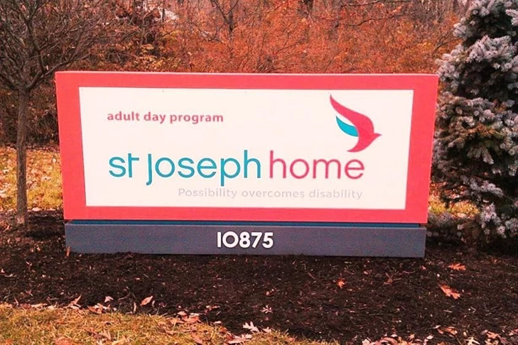 Distinguishing special facilities with distinctive monument sign design & materials.  (Monument sign by Signs Now Cincinnati for St. Joseph Home, Cincinnati, OH)
